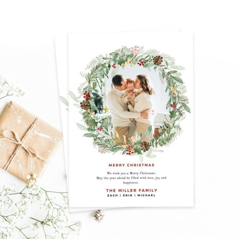 Elevate your holiday greetings with our Christmas Foliage Photo Card Template by Essem Creatives. This watercolor holiday card is printable, editable, and instantly downloadable. Personalize your message with ease using Corjl. Cherish the season's moments with a touch of elegance. 🎄✨