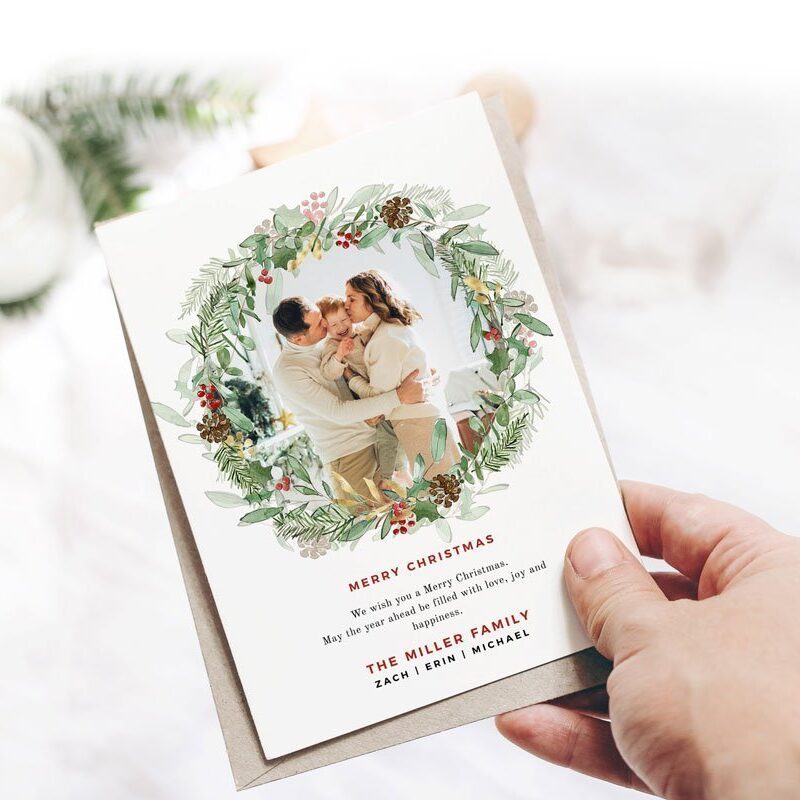 Elevate your holiday greetings with our Christmas Foliage Photo Card Template by Essem Creatives. This watercolor holiday card is printable, editable, and instantly downloadable. Personalize your message with ease using Corjl. Cherish the season's moments with a touch of elegance. 🎄✨